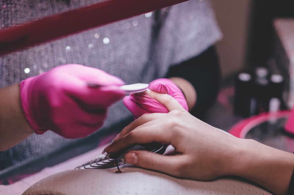 person getting a manicure