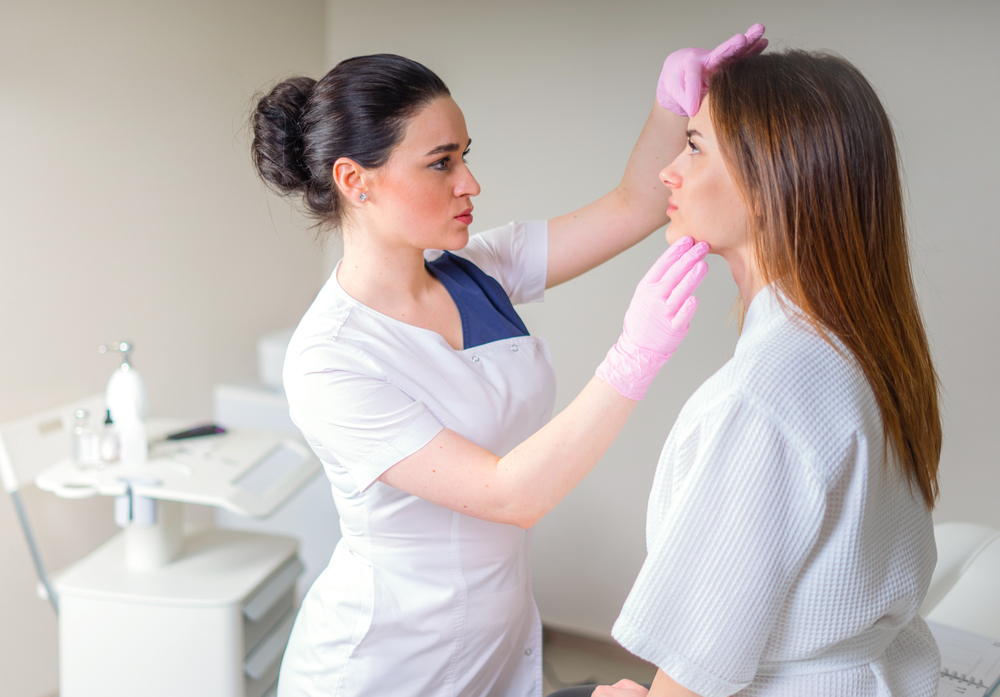 women getting her skin looked at