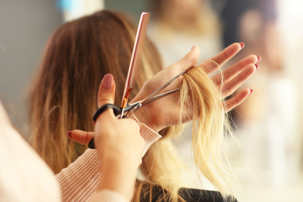 women getting her hair cut